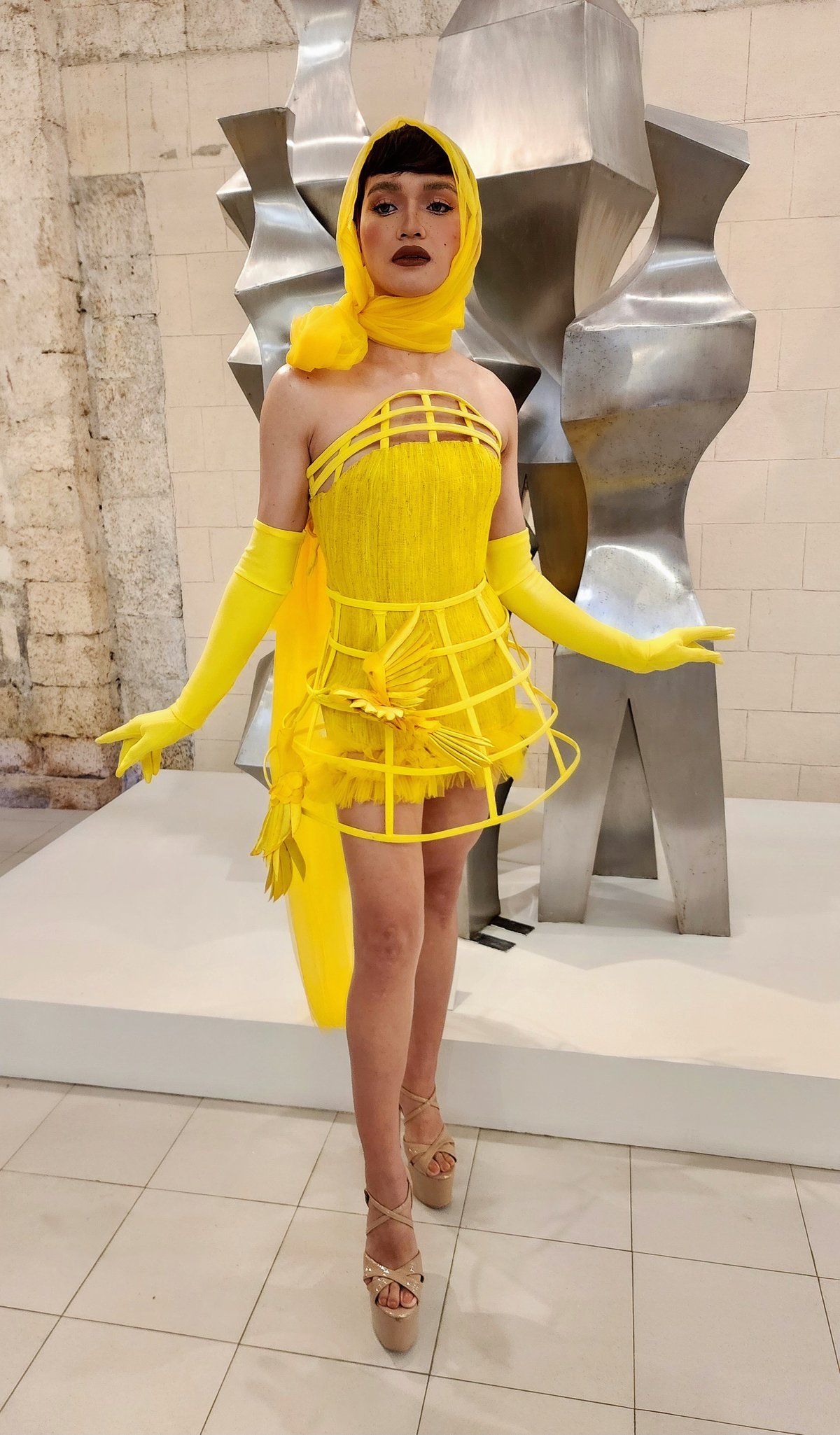 Model Laurince Catalan in attire by Noel Bompat Estopito and Christian Kent Paglinawan.